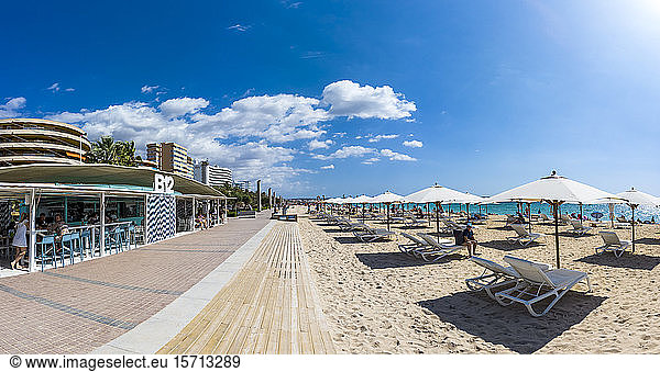 Spain  Mallorca  Camp de Mar  Rows of deckchairs and beach umbrellas along Playa de Palma in summer