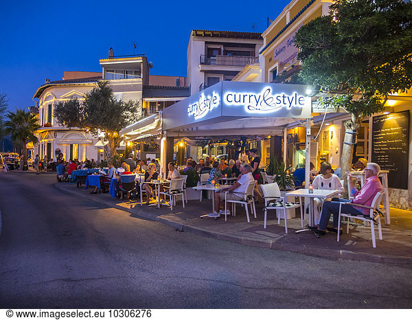 Spain  Mallorca  Port d'Andratx  restaurantsat the harbor in the evening