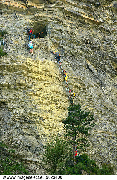 Spain  Ordesa National Park  people climbing at rock face
