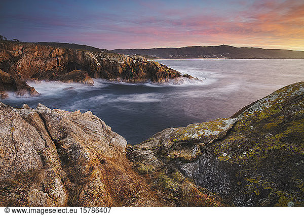 Spain  Province of A Coruna  Ferrol  Long exposure of coastal landscape at dusk
