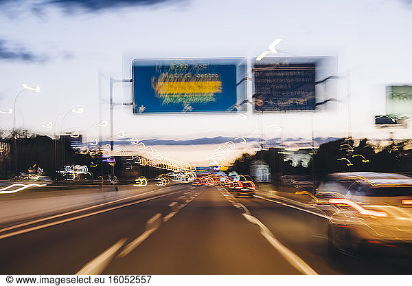 Spain  Province of Barcelona  Barcelona  traffic on city highway at dusk