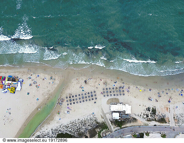 Spain  Valencian Community  Mil Palmeras  Aerial view of umbrellas on sandy beach