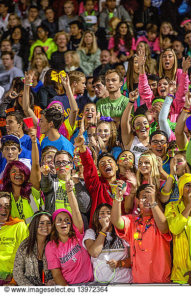 Spectators Cheer High School Football Game