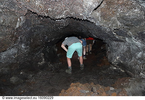 Speleological tourism  Cave of volcanic lava. Island of Pico. Azores. Portugal