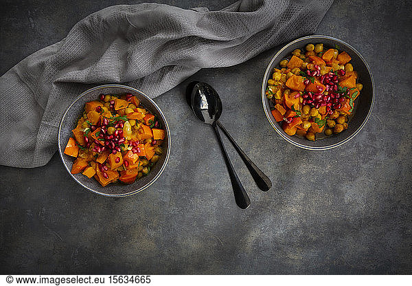 Spicy oriental pumpkin stew with Hokkaido squash  chickpeas  parsley and pomegranate seeds