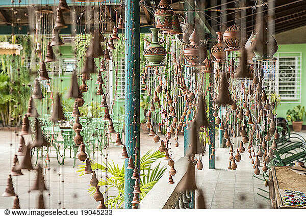 Spiral clay wind chimes on display in the studio of Daniel 'Chichi' Santander  renowned Cuban potter and owner of El Alfarero Casa Chichi  Trinidad  Cuba