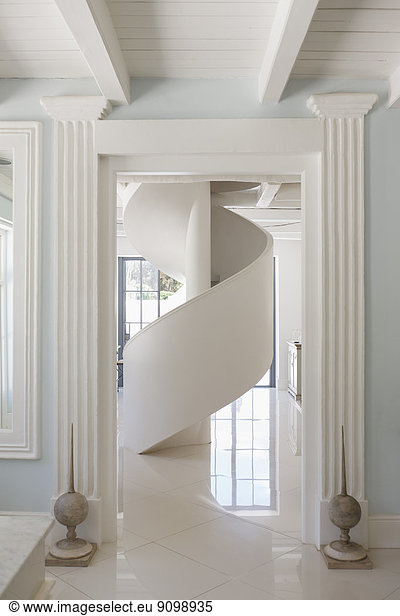 Spiral staircase in luxury foyer