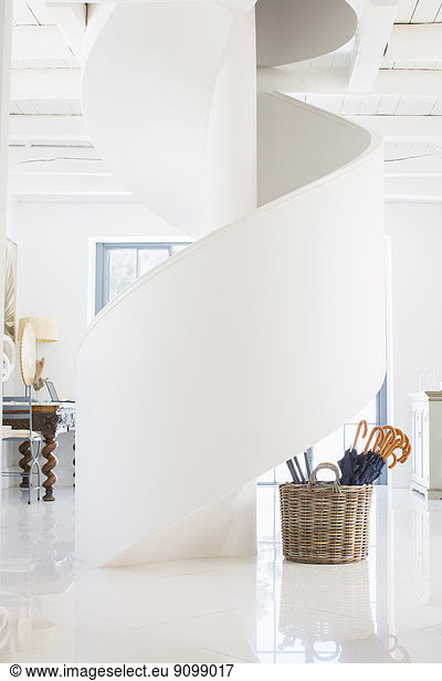 Spiral staircase in luxury foyer