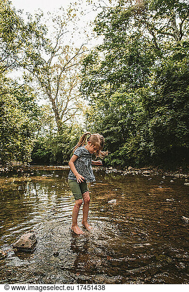 splashing in the creek in the summer
