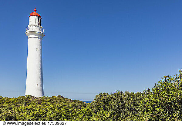 Split Point Lighthouse standing against clear blue sky