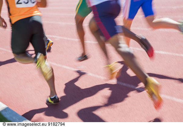 Sprinters racing on track