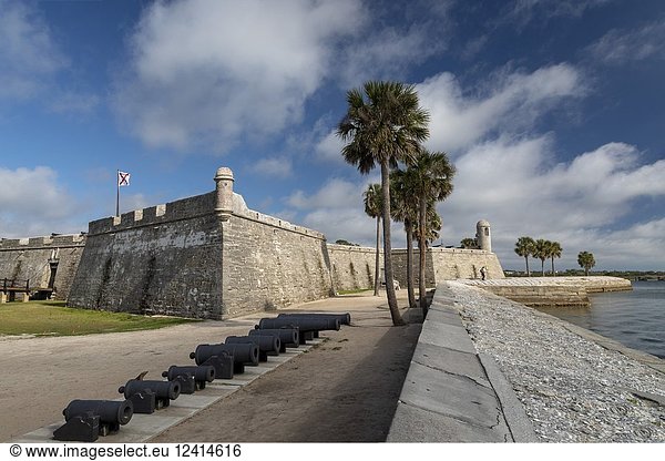 St. Augustine  Florida - Castillo de San Marcos National Monument. The Spanish built the fort in the late 17th century. It was later occupied by British and then American troops. The Spanish Cross of Burgundy flag flies over the fort.
