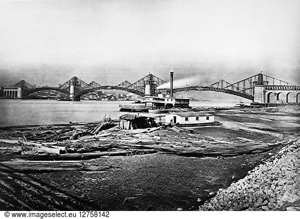 ST. LOUIS: EADS BRIDGE. A view of the Eads Bridge  spanning the Mississippi River between East St. Louis  Illinois (foreground) and St. Louis  Missouri  as it appeared near the end of its construction  with the center and east arches not yet completed. Photographed c1874.