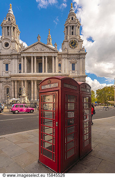 St Paul's Cathedral with iconic telephone cell and london taxi
