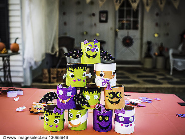 Stack of various decoration at table during Halloween party