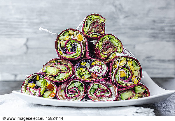 Stack of various ready-to-eat beetroot wraps