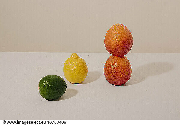 Stacked citrus fruit still life