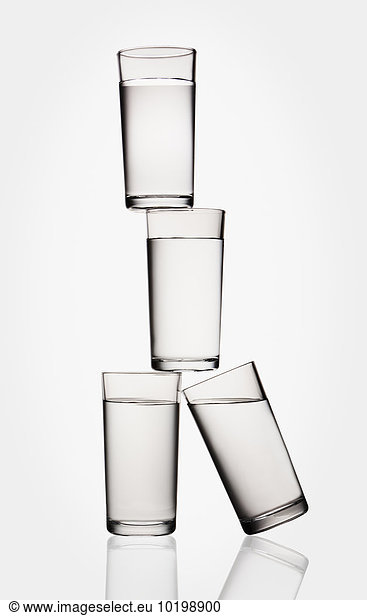 Stacked water glasses balancing