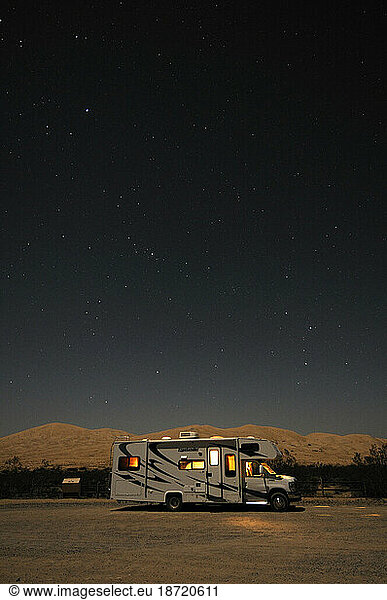 Stars over an RV camper at Kelso Dunes  Mojave National Preserve  Kelso  California  USA