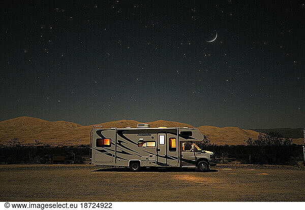 Stars over an RV camper at Kelso Dunes  Mojave National Preserve  Kelso  California  USA