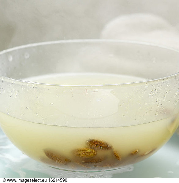 Steam bath with almonds  close-up