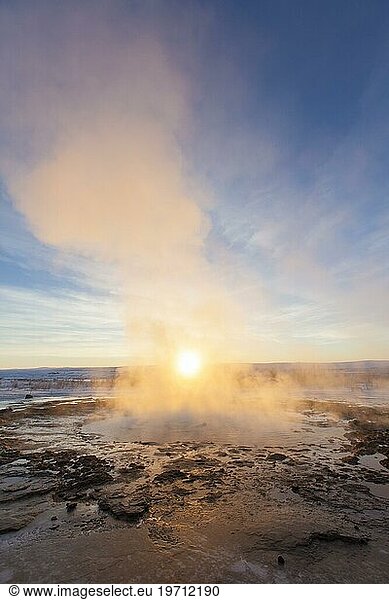 Steam phase eruption of Strokkur  fountain geyser in the geothermal area beside the Hvítá River in winter  Haukadalur  Sudurland  Iceland  Europe