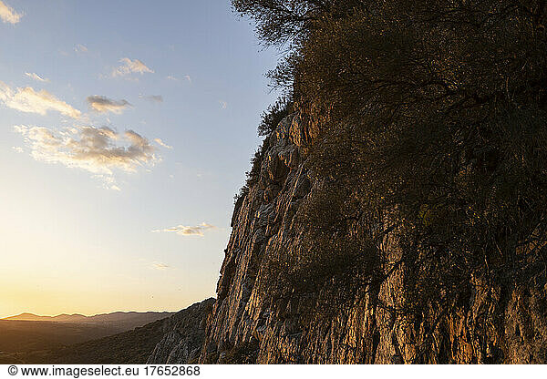 Steep cliff in Monfrague National Park at dusk