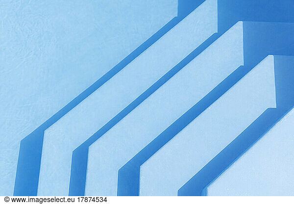 Steps in empty swimming pool