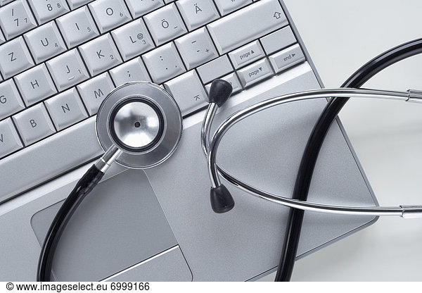 Stethoscope and Laptop Computer