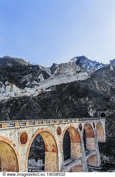 Stone bridge leading from town of Carrara to marble mines  Tuscany  Italy