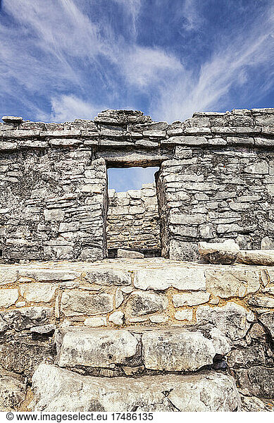 Stone steps and doorway in the archaeological site and Mayan ruins of Tulum