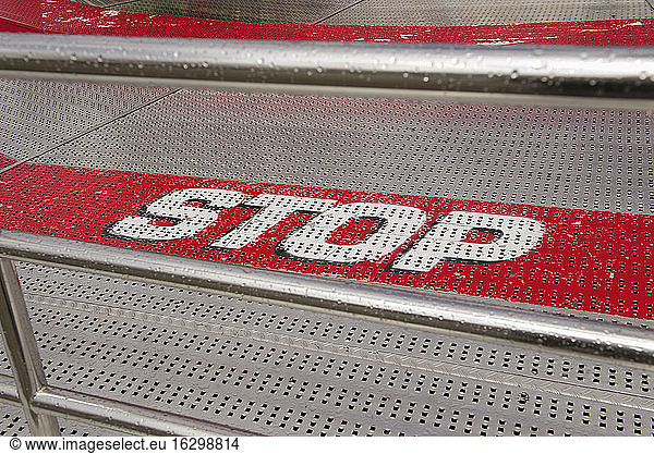 Stop at steps at fairground ride