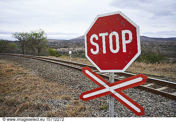 Stop sign at a railway track  KwaZulu-Natal  South Africa