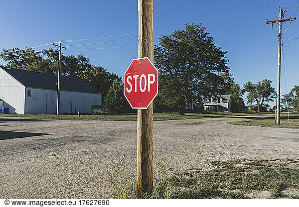 Stop sign at a road intersection.