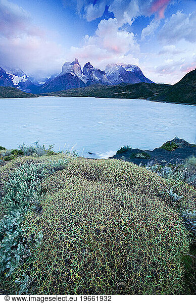 Storm clouds passing over Lago Pehoe and the Cuernos Del Paine in Las Torres Del Paine National Park  Chile.