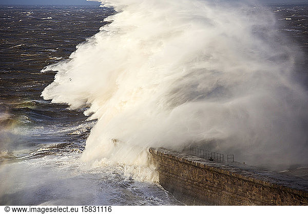 Storm waves from an extreme low pressure system batter Whitehaven harbour  Cumbria  UK  on the 10th December 2014.