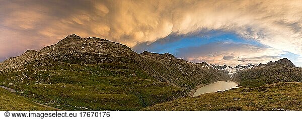 Stormy atmosphere over Lake Oberaar and the Bernese Alps  Canton Bern  Switzerland  Europe