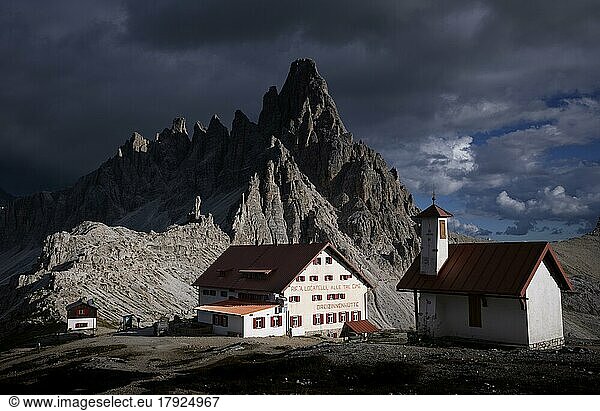 Stormy atmosphere  view of Dreizinnenhütte  chapel  Paternkofel  South Tyrol  Trentino  Sesto Dolomites  Italy  Europe