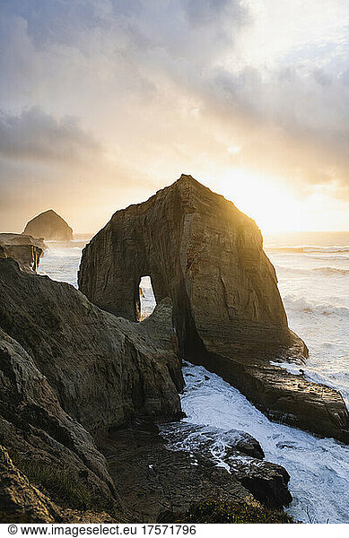 Stormy ocean waves during dusky sunset in coastal Oregon