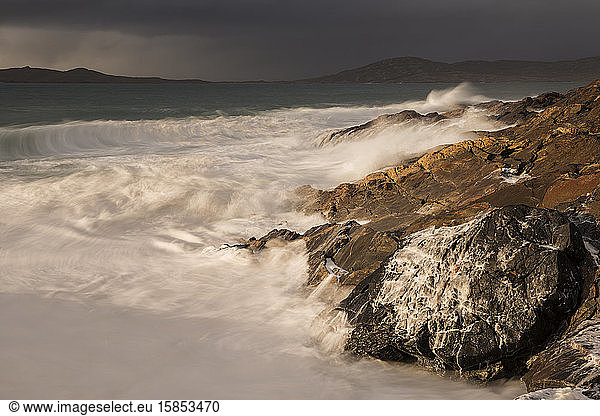 Stormy sea washes across rocky coastline  near Scarista  Isle of Harris  Scotland