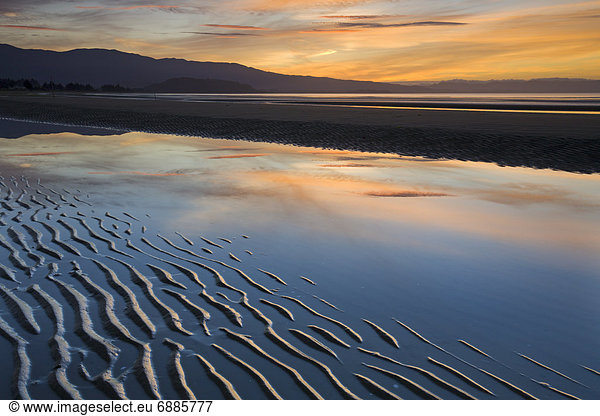 Strand Sonnenuntergang Sand gewellt Pazifischer Ozean Pazifik Stiller Ozean Großer Ozean neuseeländische Südinsel Golden Bay Neuseeland