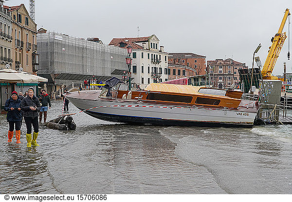 Stranded taxi boat during the high tide in Venice  November 2019  Venice  UNESCO World Heritage Site  Veneto  Italy  Europe