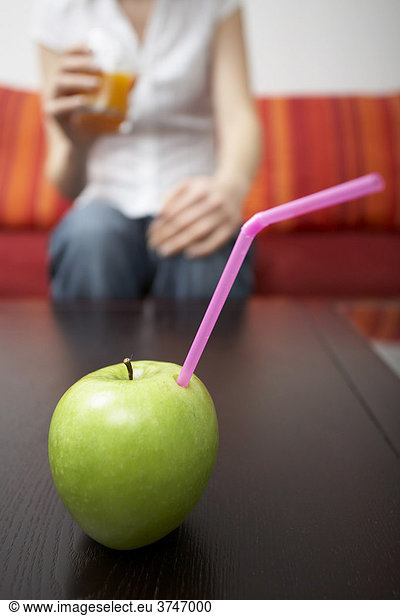 Straw in apple  pure apple juice