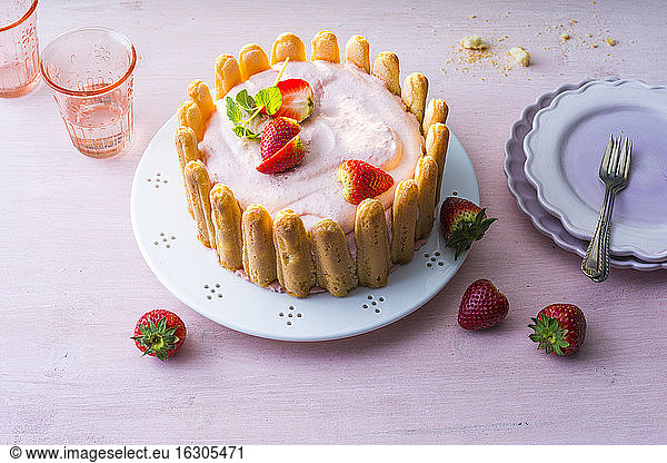 Strawberry charlotte with ladyfingers and sour cream