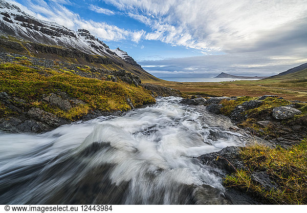 Stream running to the ocean on the Strandir Coast  West Fjords  Iceland