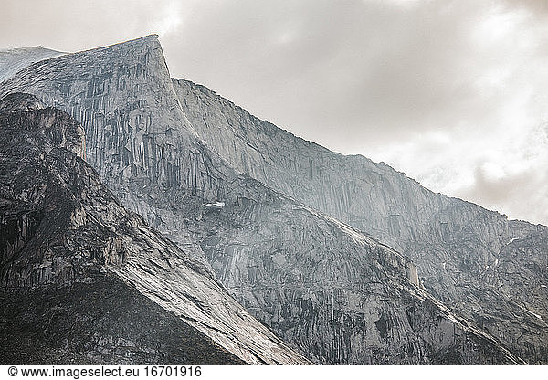 Striking granite mountain rises above Akshayak Pass.