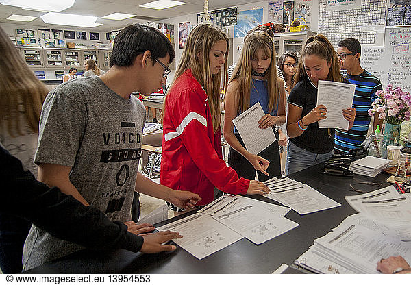Students Receiving Exam Scores