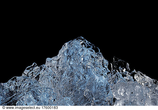 Studio shot of clear lumps of melting ice