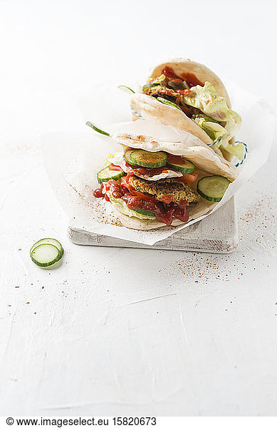 Studio shot of falafel veggie burger with pita bread