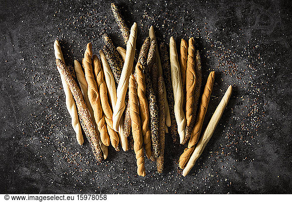 Studio shot of four different kinds of Italian grissini breadsticks